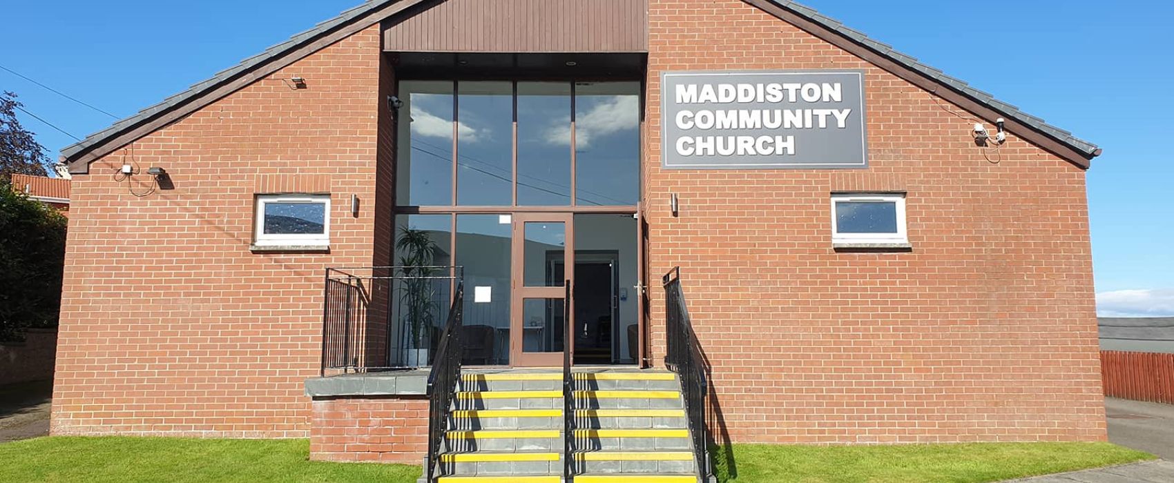 Maddiston Community Church front view on sunny day